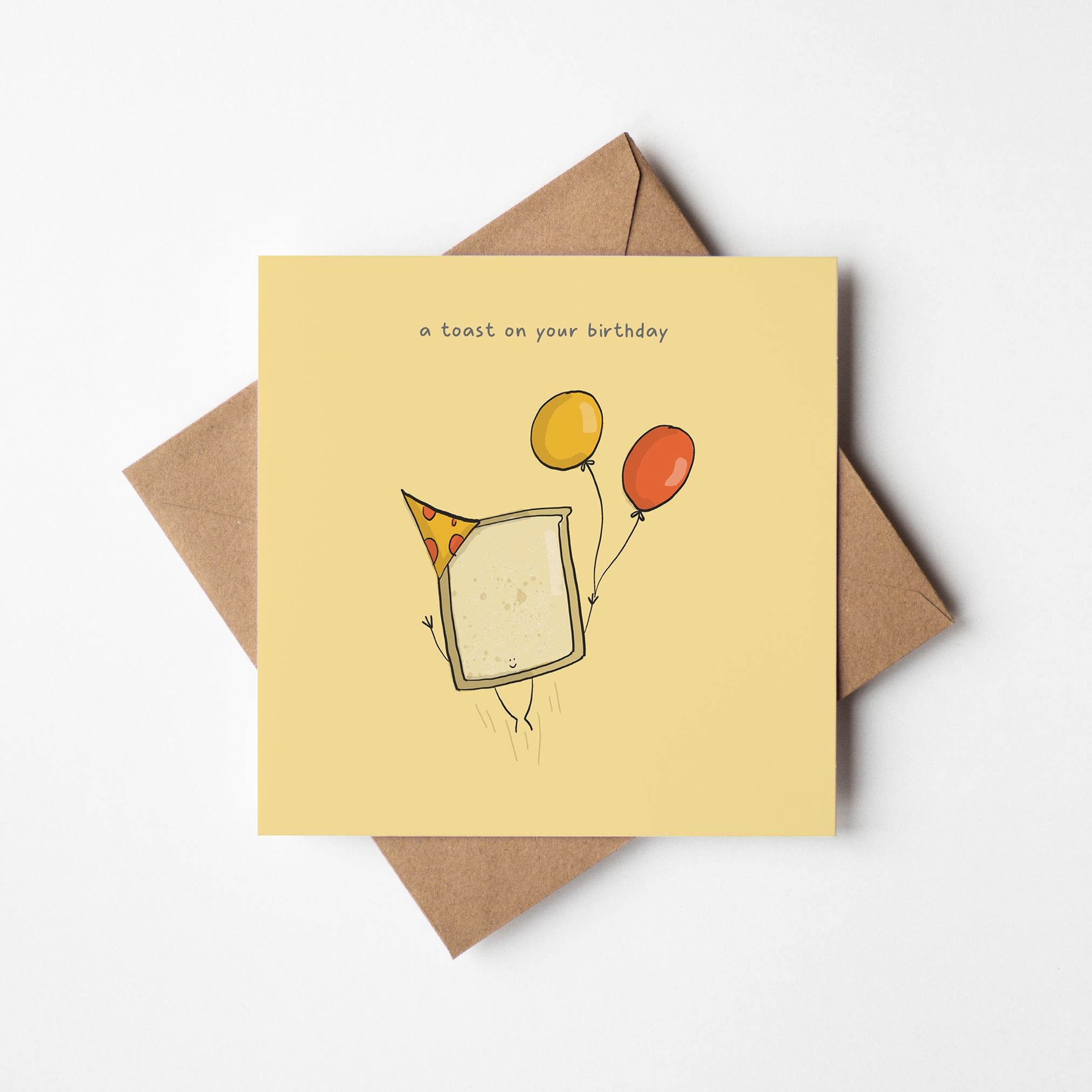 Toast On Your Birthday greeting card showing cute illustrated toast character with birthday message on white card"