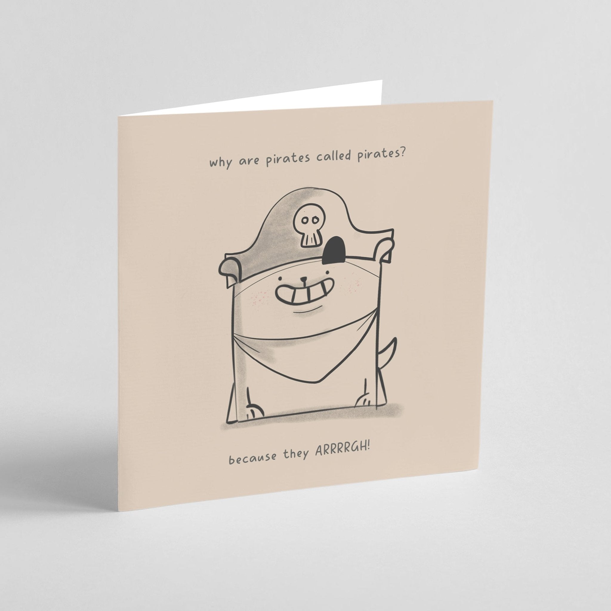 Card with a cartoon dog in a pirate costume and humorous text on a beige background