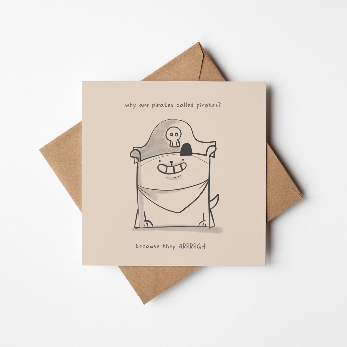 unny pirate joke card featuring adorable dog character with skull and crossbones hat and kraft envelope