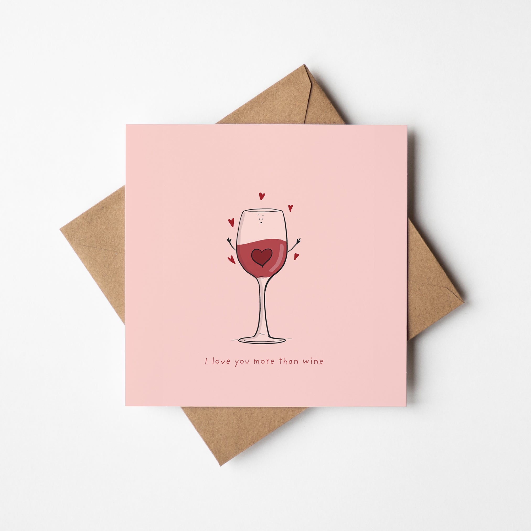 Cute kawaii wine glass with hearts saying I love you more than wine greeting car