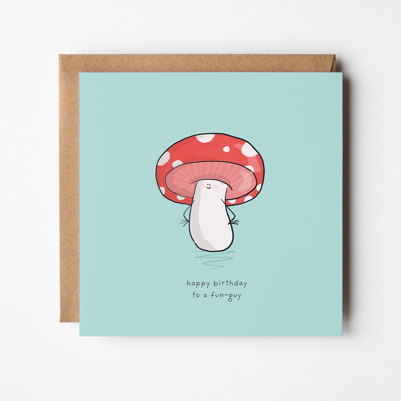 A birthday card with a cartoon mushroom on a light blue background.