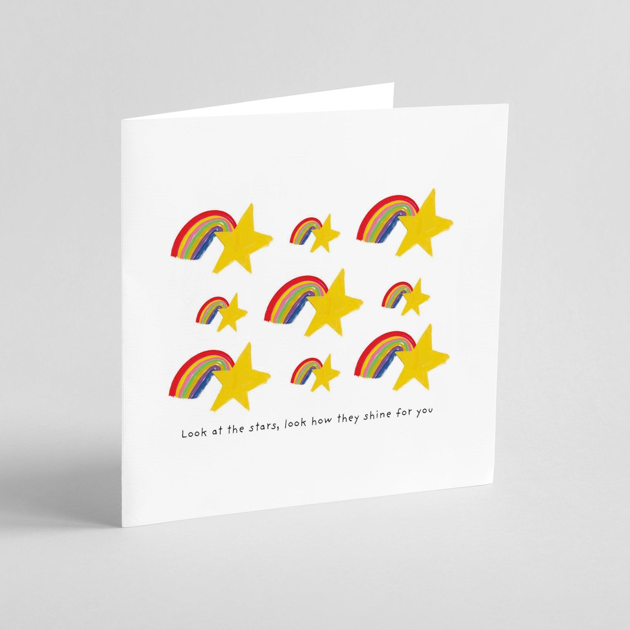 Greeting card with rainbow and stars illustration and uplifting message on white background