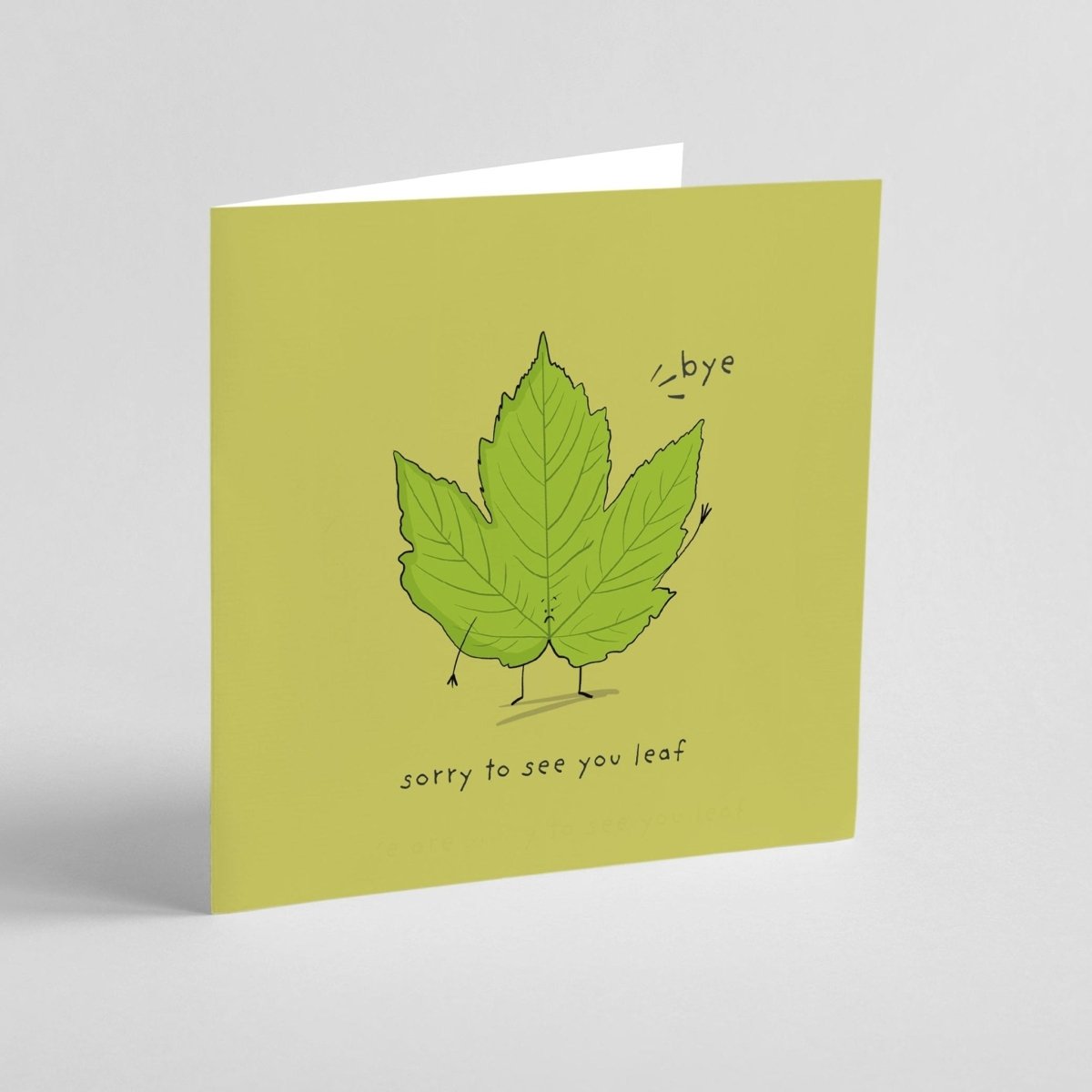 Greeting card with adorable leaf illustration and punny farewell message on green background
