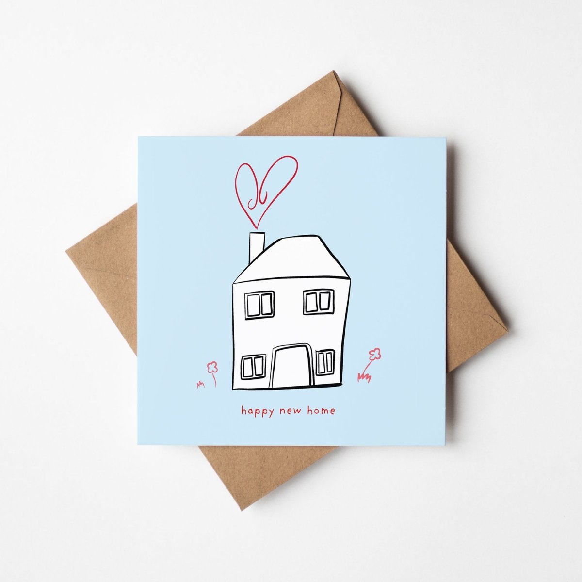 Warm Wishes Happy New Home greeting card featuring cute kawaii house illustration with cozy design