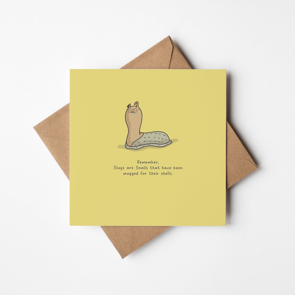 Why Slugs Lost Their Shells greeting card showing cute grumpy slug character with humorous text