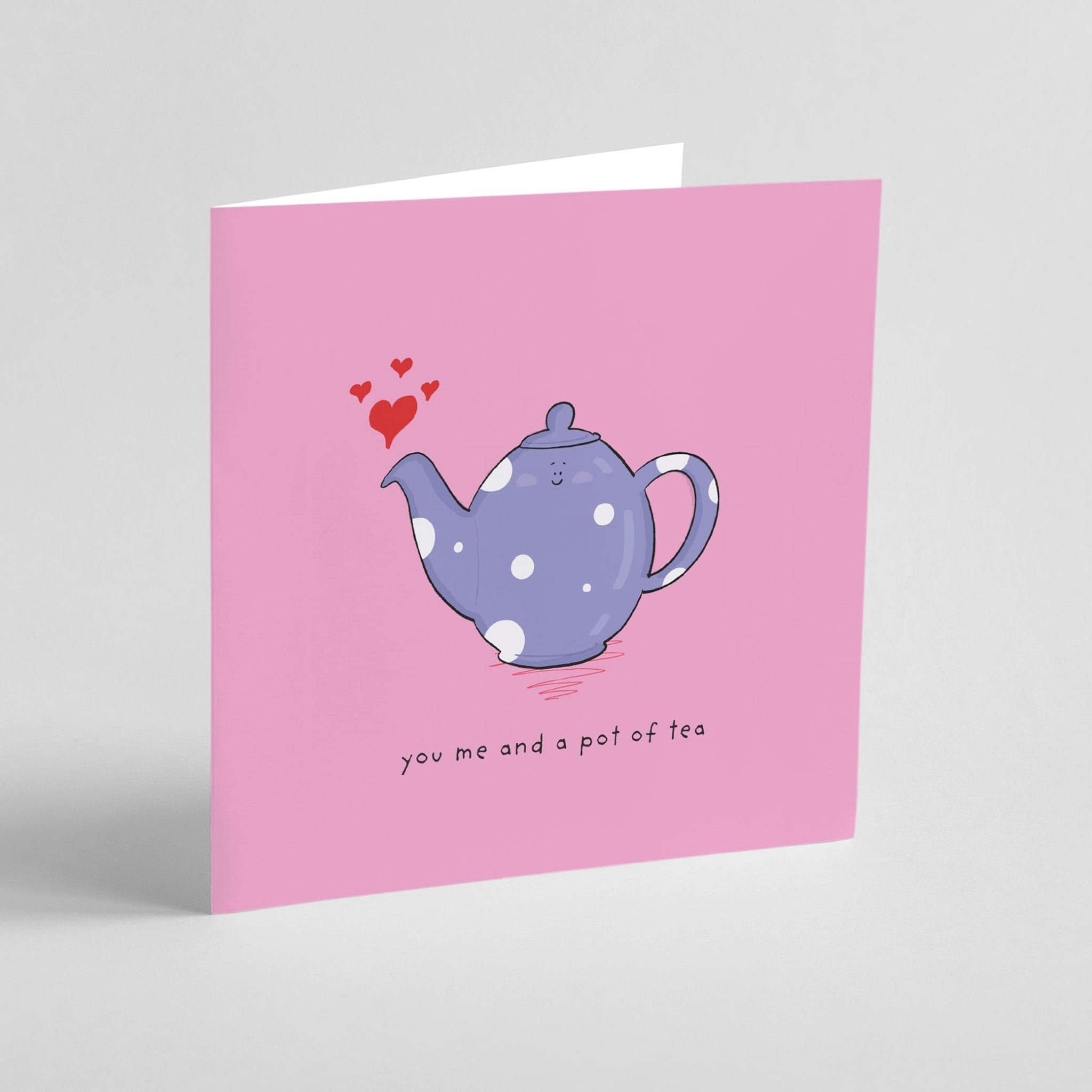 Greeting card with a purple teapot illustration on a pink background