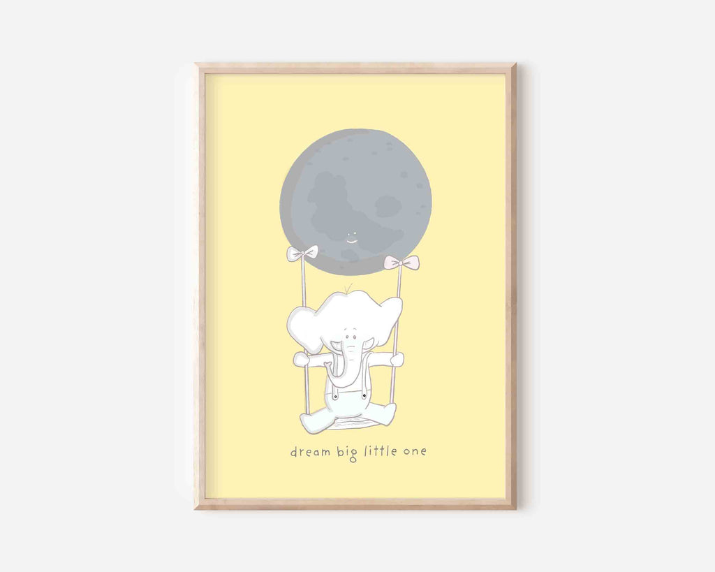 Whimsical 'Dream Big Little One' art print by Richard Darani, showcasing a white elephant on a swing and a grey moon against a warm yellow backdrop."