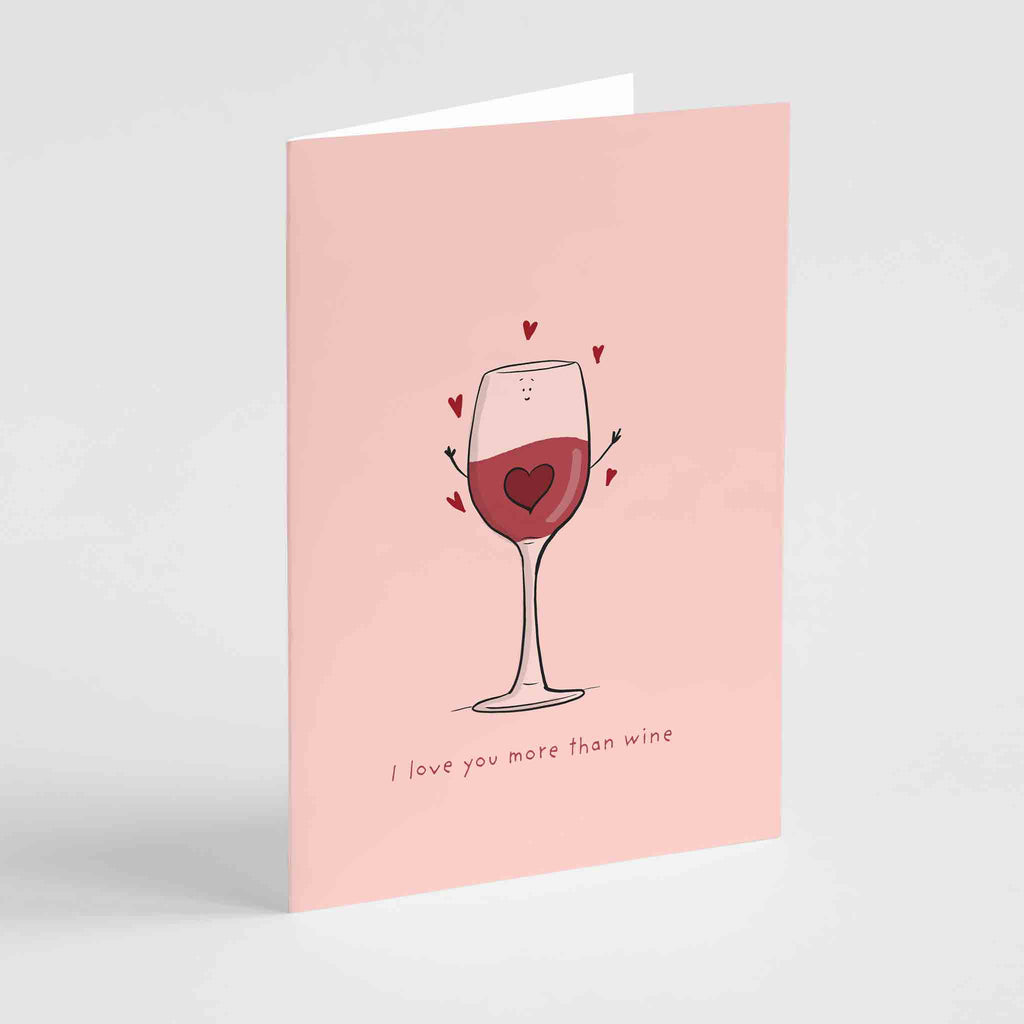 "Elegant 'I Love You More Than Wine' greeting card by Richard Darani, showcasing a wine bottle with surrounding hearts, ideal for conveying love on special occasions."