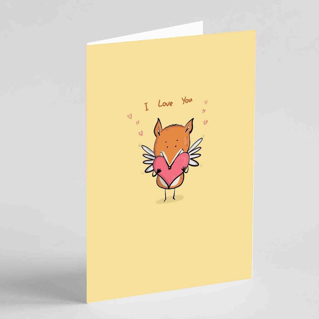 Hand-drawn 'I Love You' greeting card with an adorable orange fox holding a pink heart and angelic wings, against a soft pastel yellow background."