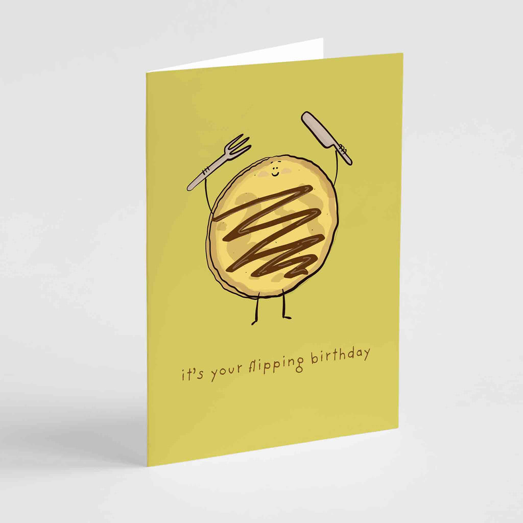 Illustrated birthday card with smiling pancakes, titled "It's Your Flipping Birthday" by Richard Darani, perfect for a fun and humorous birthday greeting.