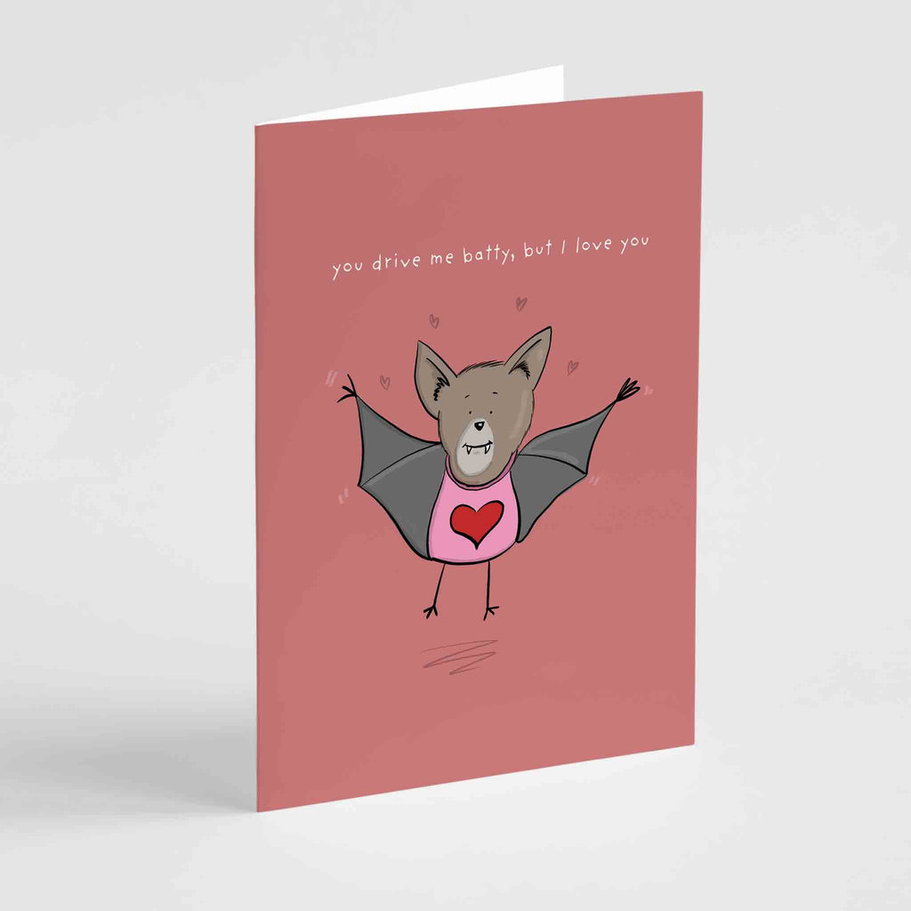 Adorable 'You Drive Me Batty' greeting card by Richard Darani, featuring a cute bat with a heart, perfect for expressing love with a humorous twist on special occasions."