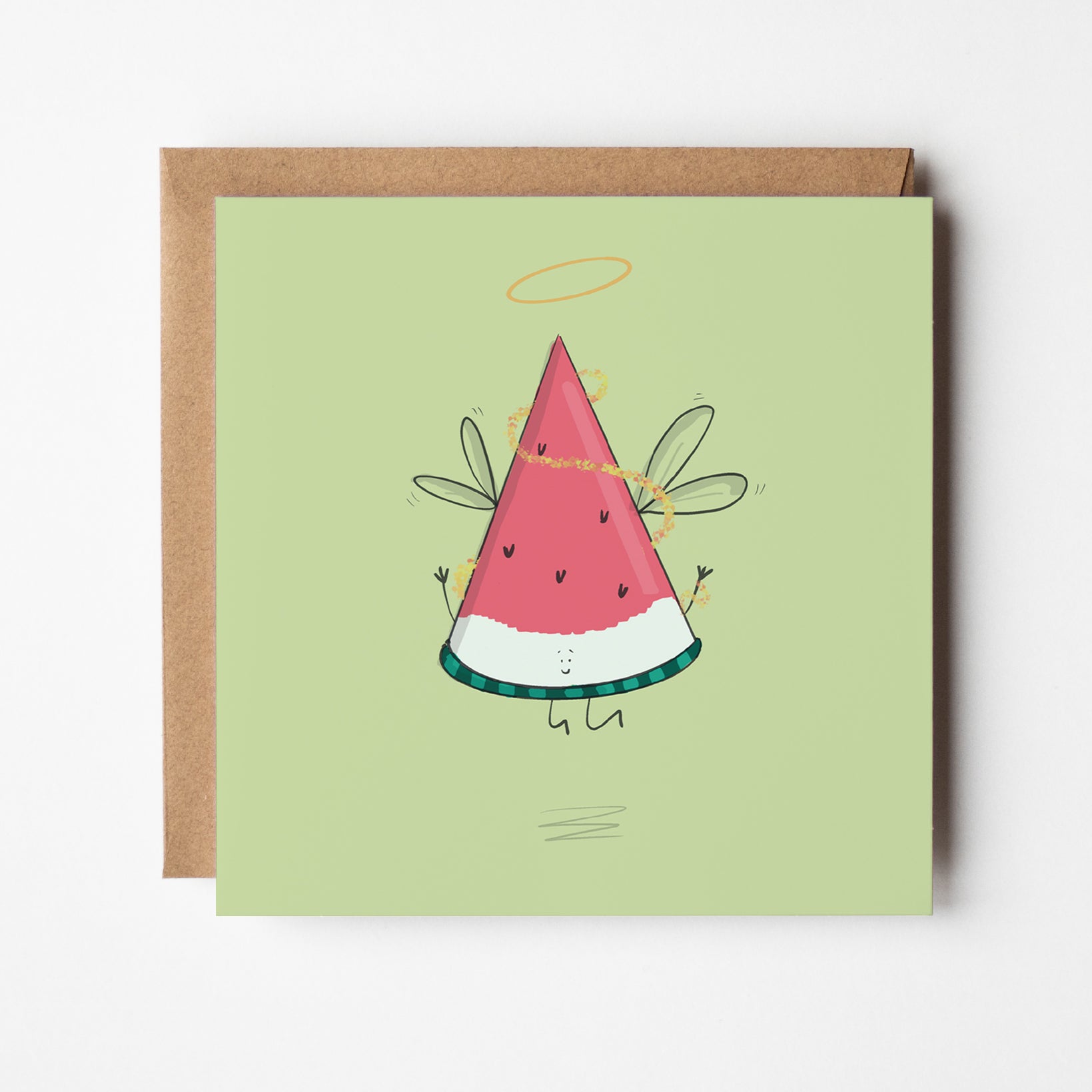 Angel watermelon slice Christmas greeting card featuring cute kawaii fruit with wings and halo