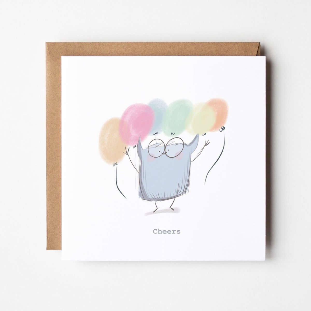 Cheers celebration card featuring kawaii character with glasses holding colourful balloons