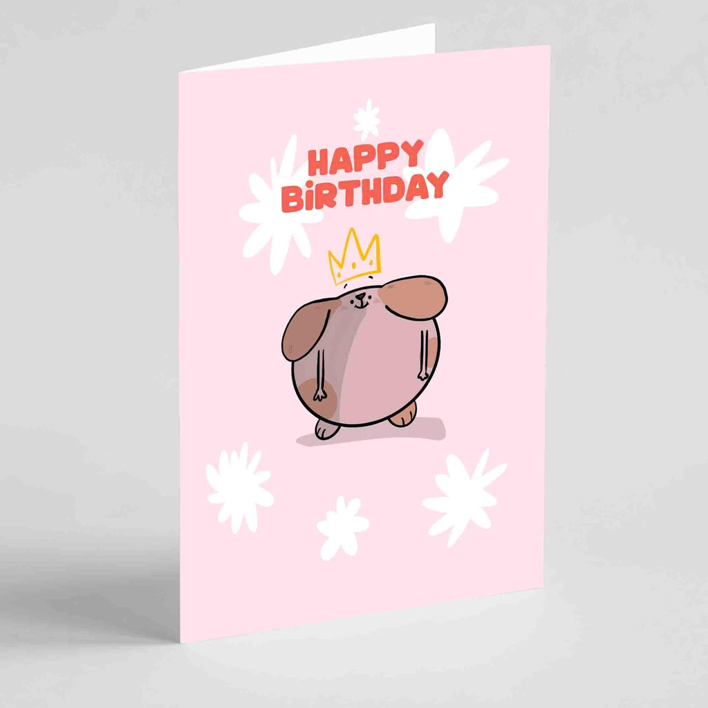 Handmade 'Happy Birthday Princess' greeting card, showcasing a cute dog wearing a crown against a vibrant pink backdrop, crafted from premium silk card."