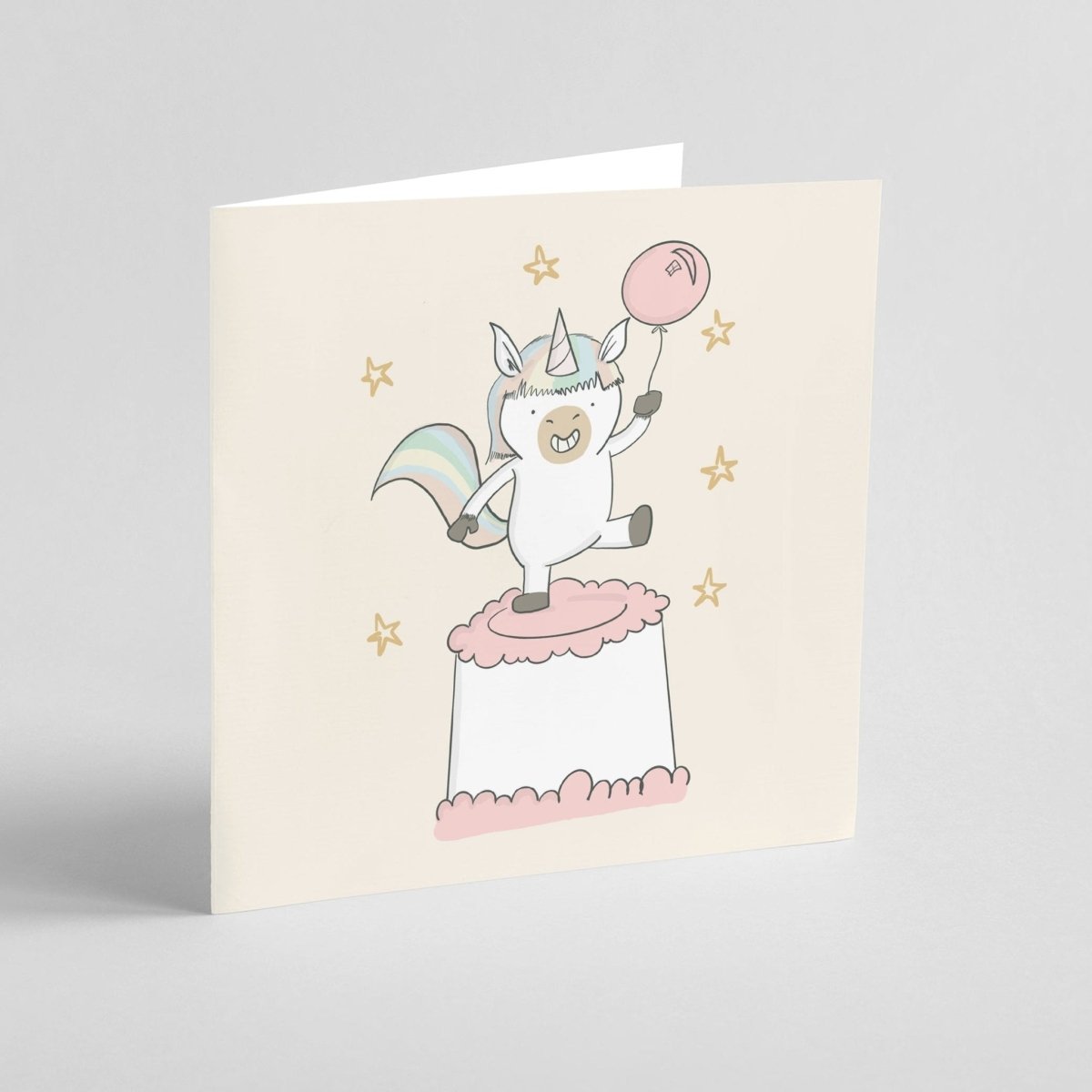 Greeting card with a cartoon unicorn on a white background