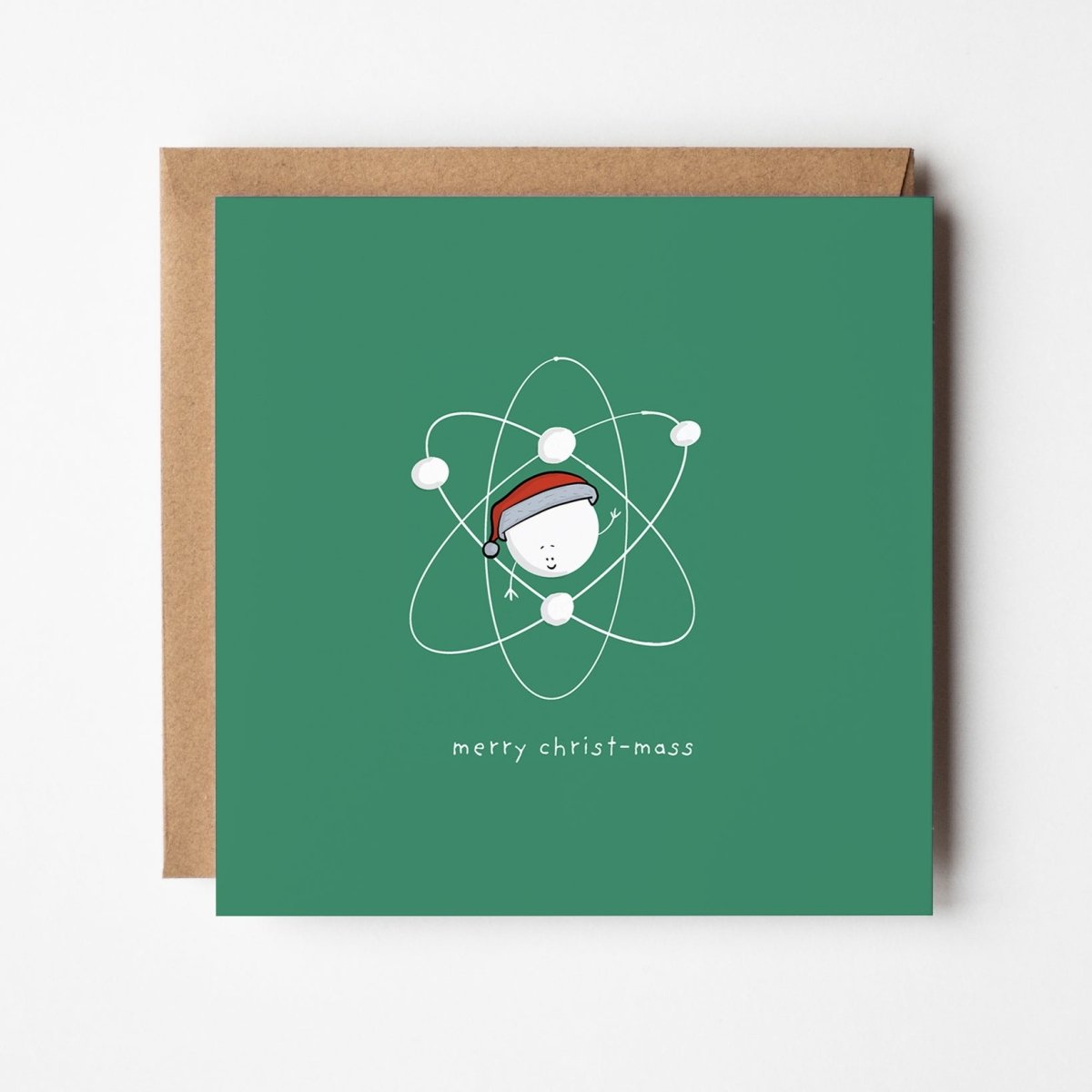 Merry Christ-Mass science Christmas card featuring kawaii atom with Santa hat