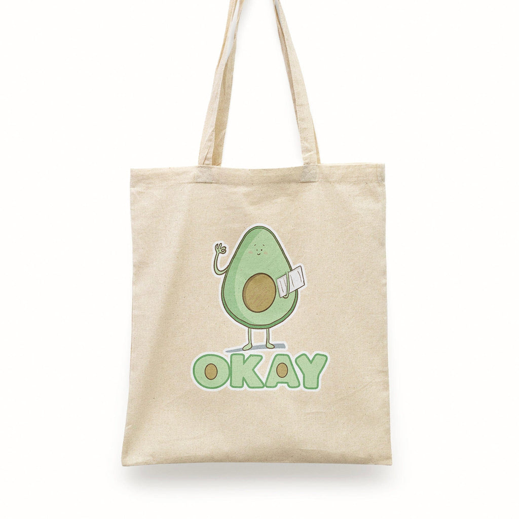 Eco-friendly cotton tote bag featuring a playful winking avocado vinyl design, ideal for groceries, books, and daily essentials