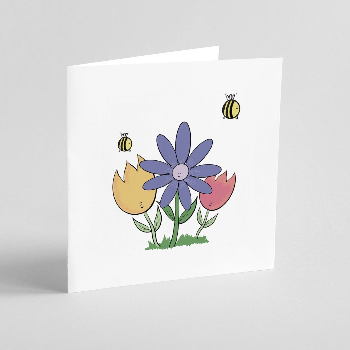 Greeting card with purple daisy, yellow and coral tulips, and cute bees on white background