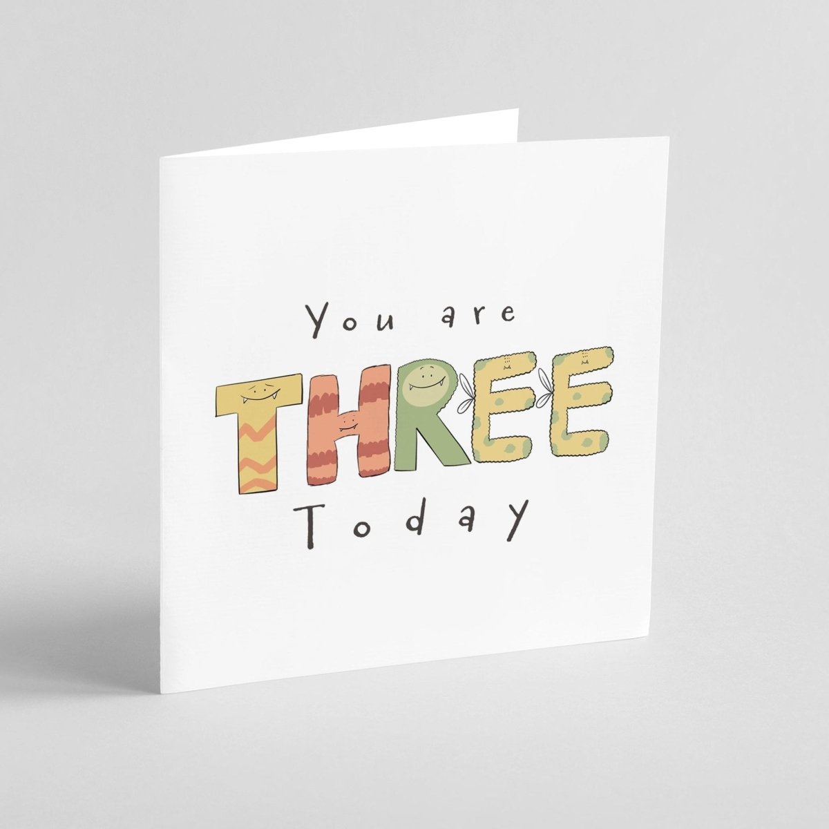 Greeting card with 'You are THREE Today' text on a white background