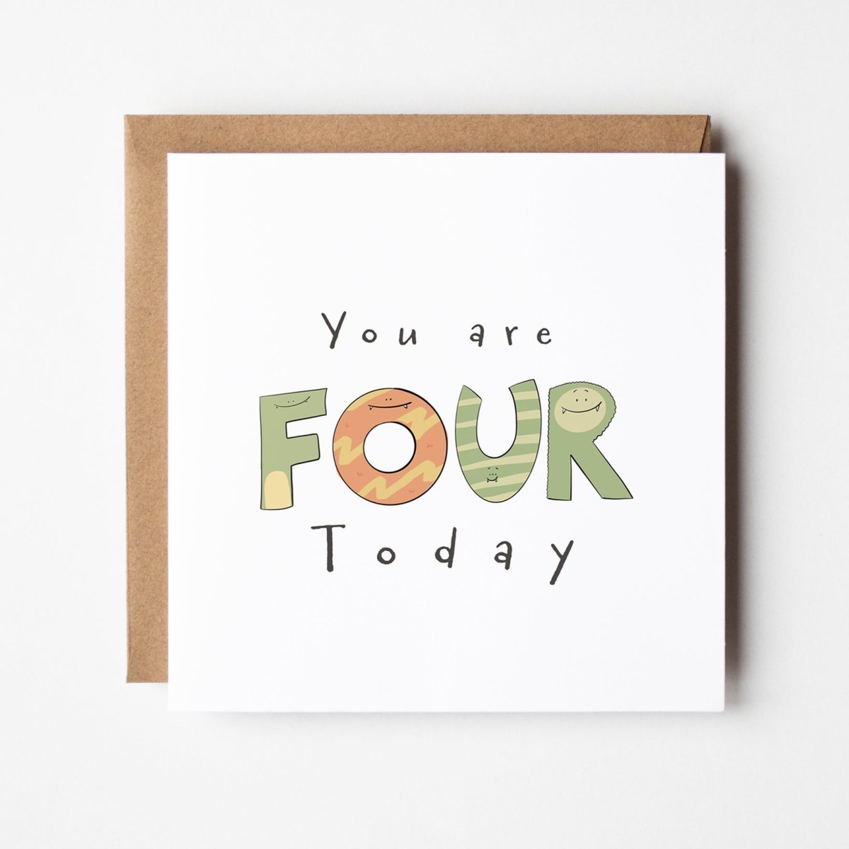 Monster birthday card mockup showing FOUR spelled with colorful stripy monster characters