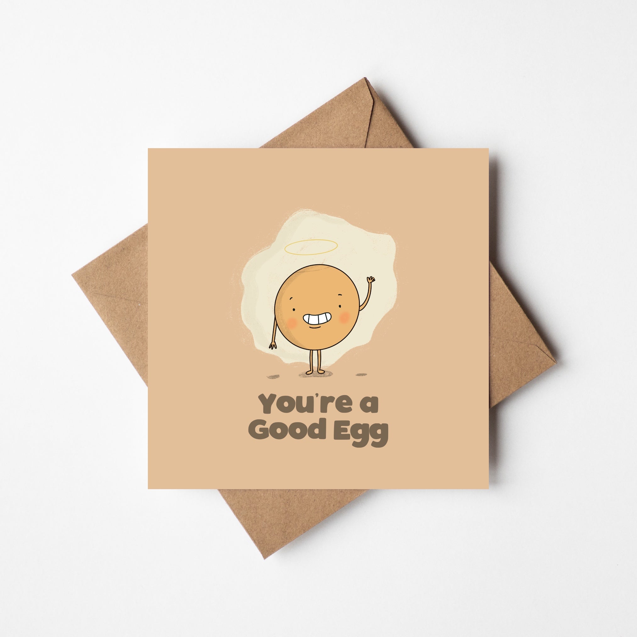 Greeting card with cartoon egg character and 'You're a Good Egg' text on a beige background